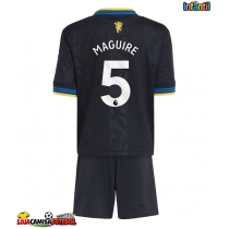 Camisa de Futebol Manchester United Harry Maguire #5 Equipamento Alternativo Infantil 2025-26 Manga Curta (+ Calças curtas)